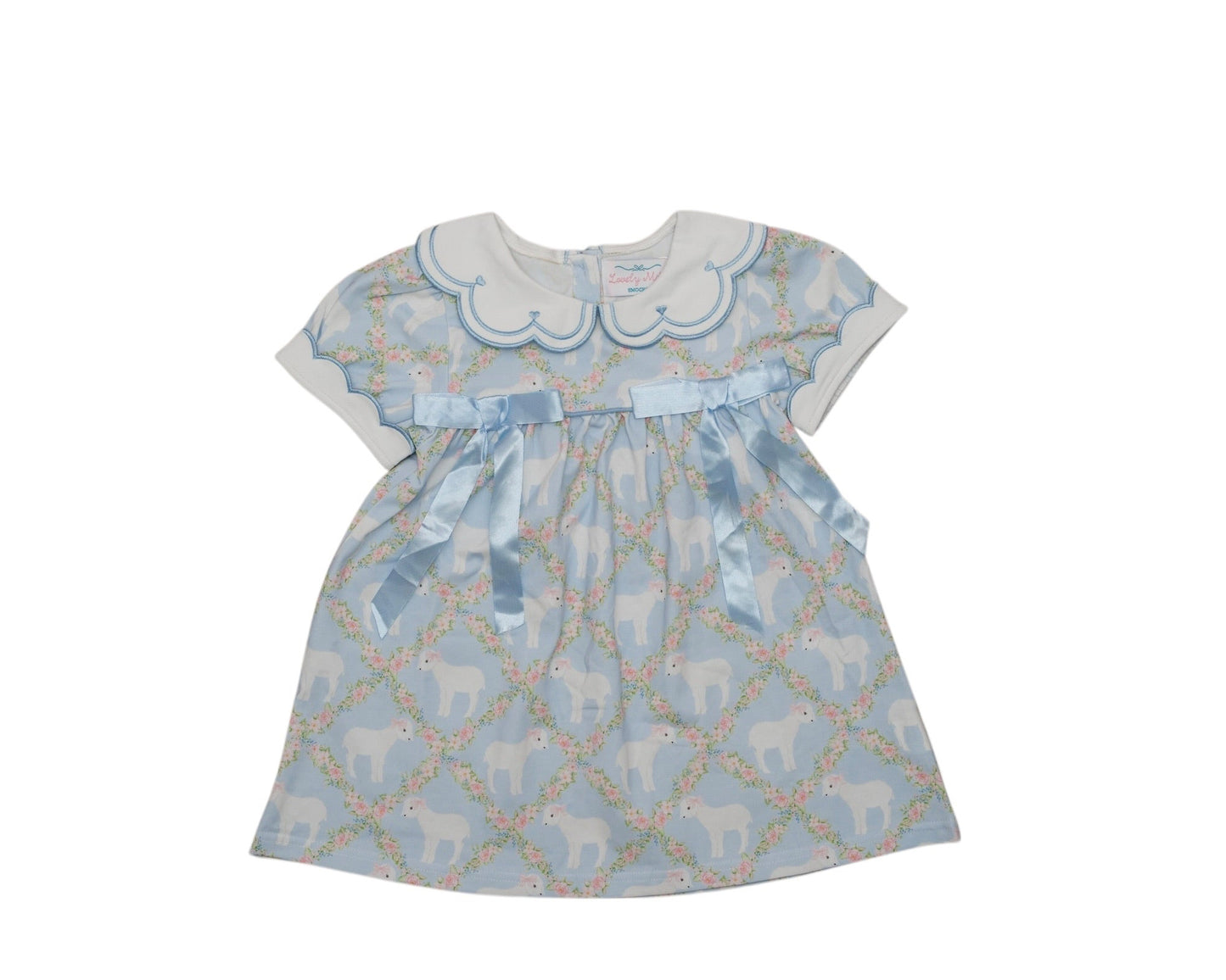 Children's dress with lattice pattern and bow on a white background