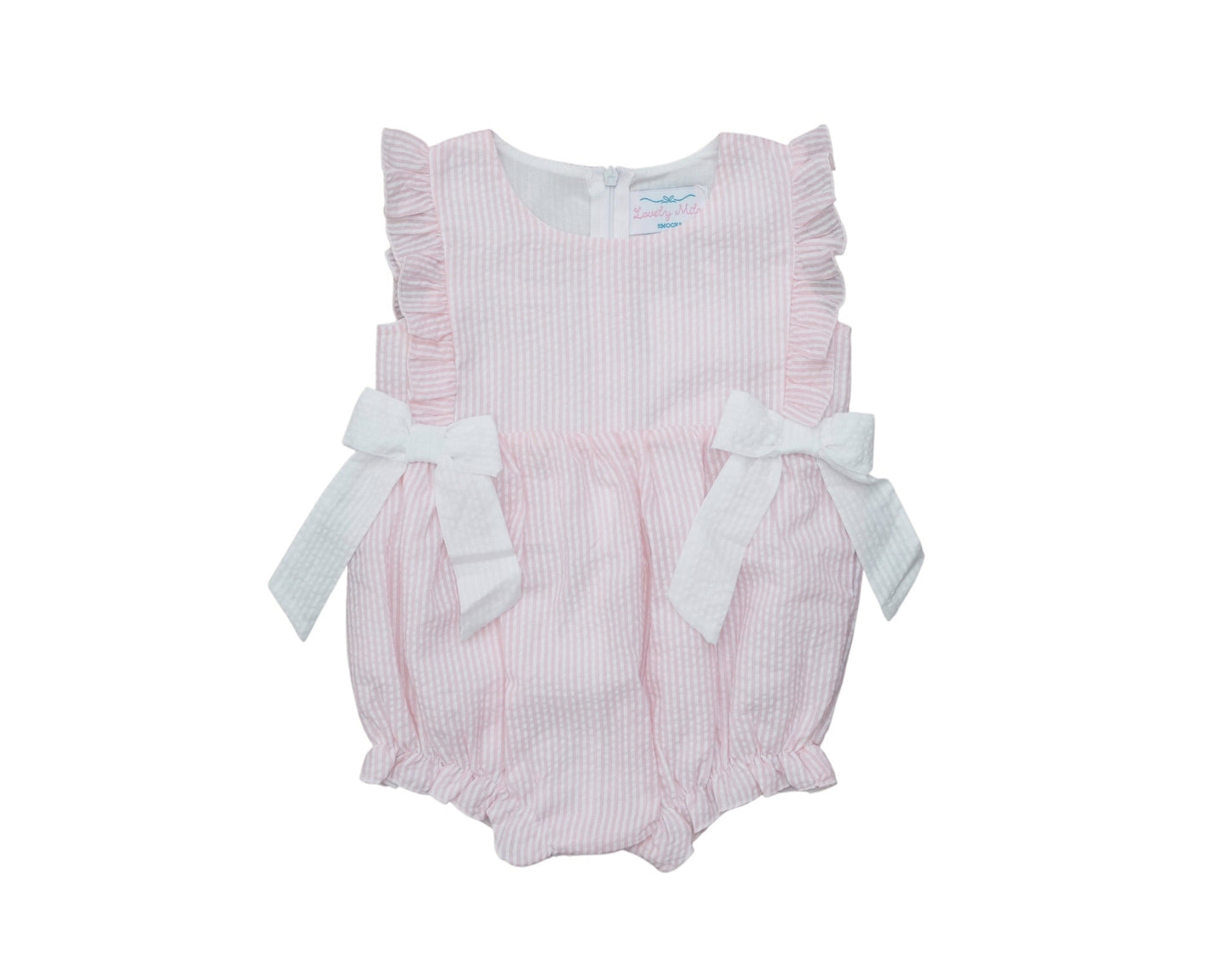 Pink baby romper with white bows on a white background