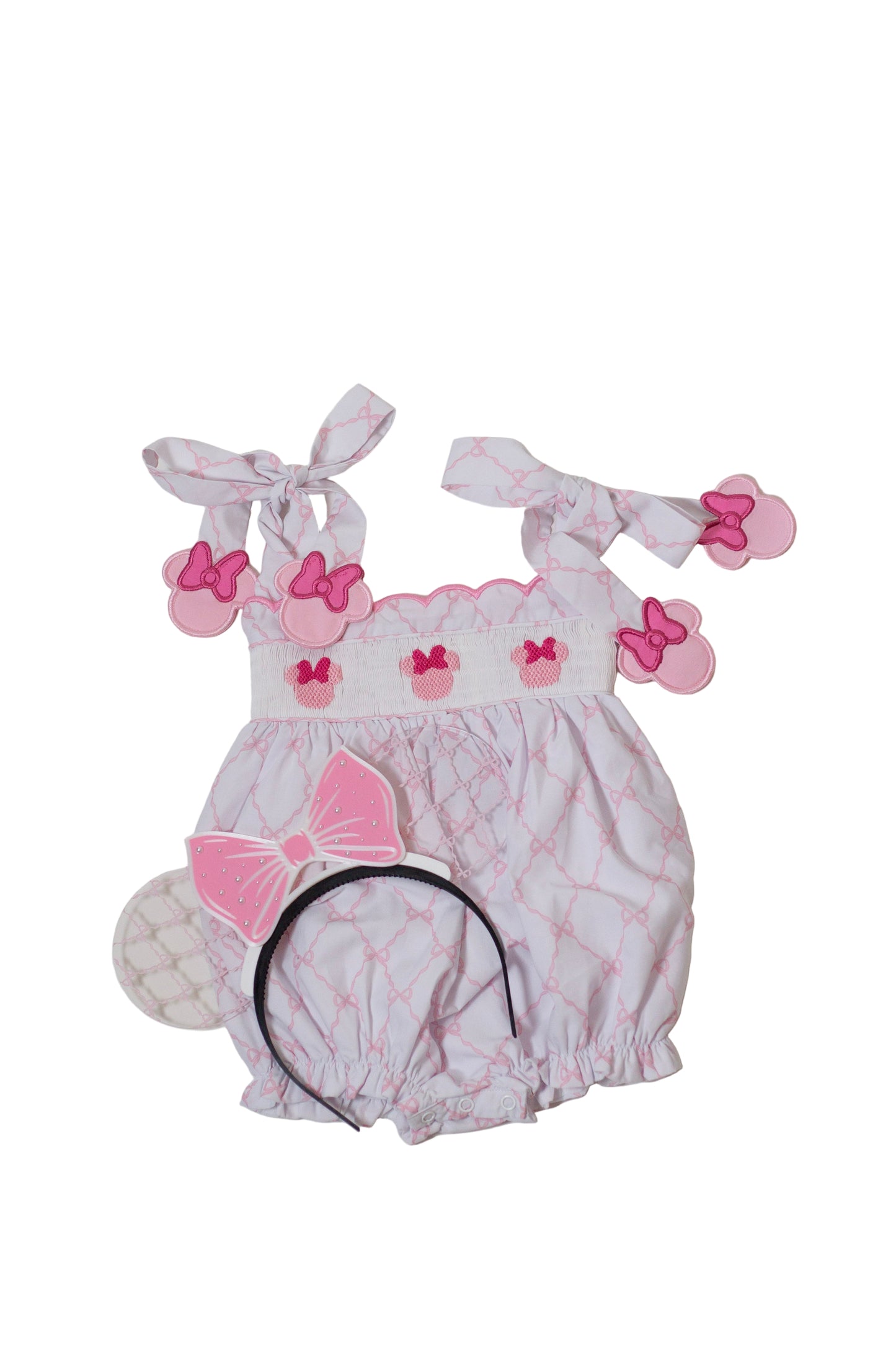 Pink baby bubble with hand smocking, bows trellis fabric, and appliqué pink mouse heads.