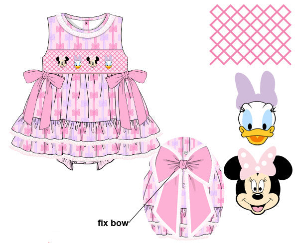A digital mockup of a custom woven baby dress template featuring pink and white patterns, cartoon character faces (Minnie Mouse, Daisy Duck), and a pink bow detail on a white background.
