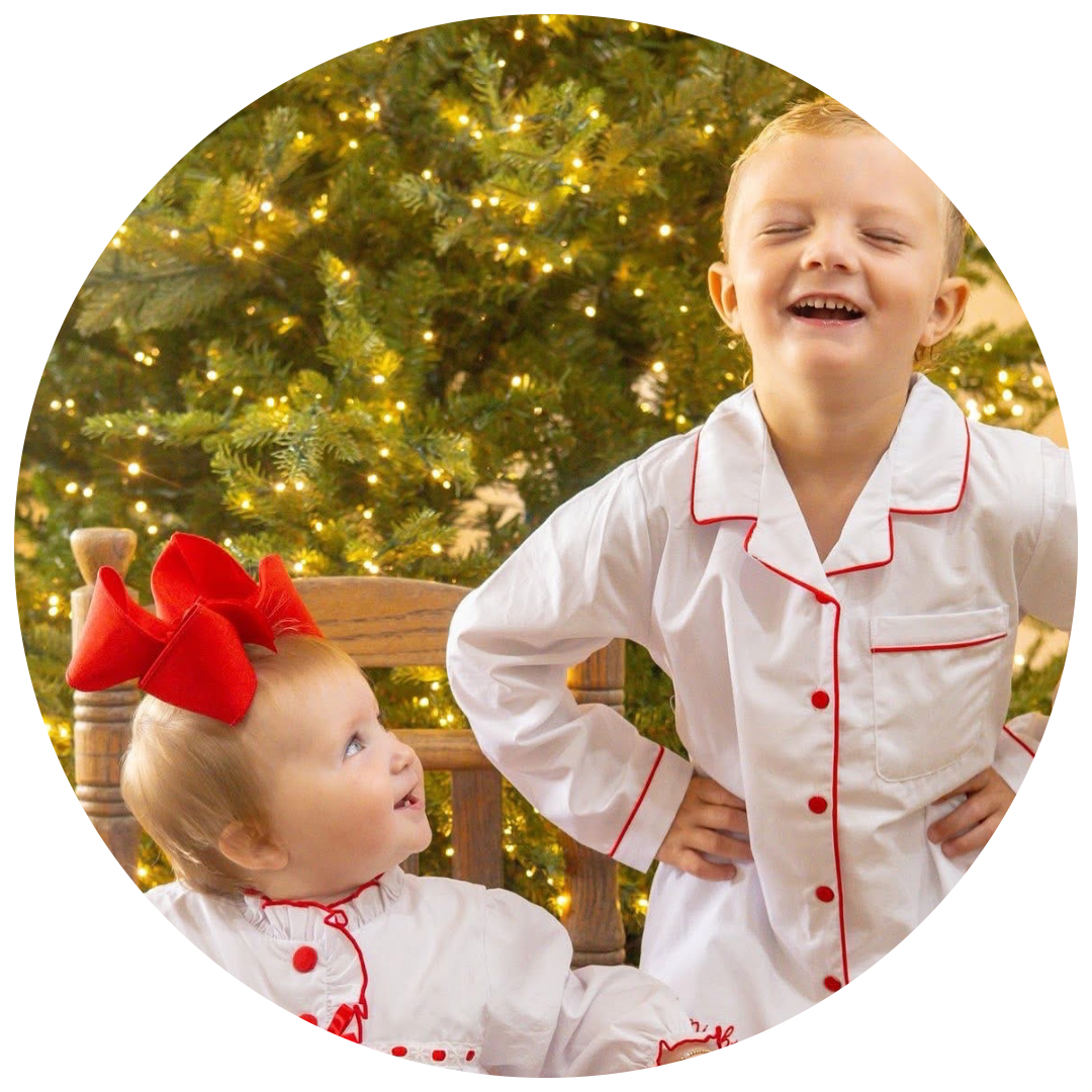 Hand-smocked Christmas bubble with seasonal details