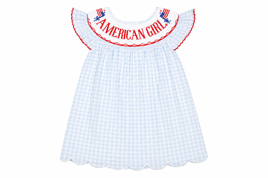 White checkered dress with 'American Girl' embroidery on a white background
