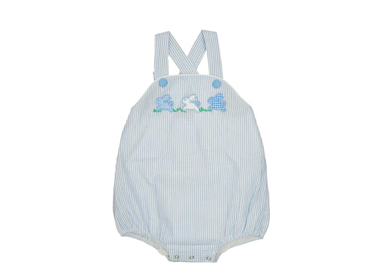 Baby romper with suspenders on a white background