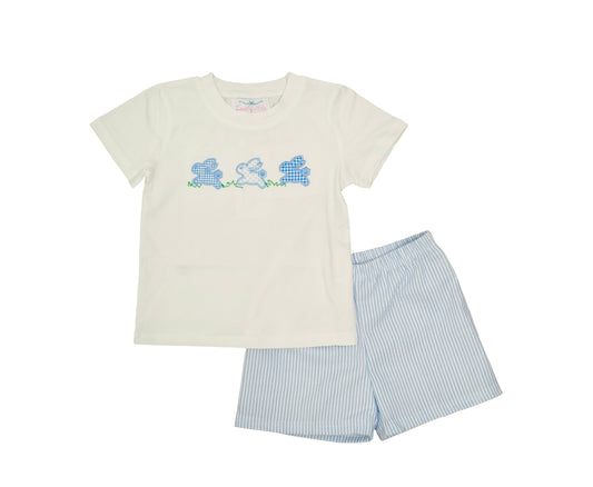 Children's outfit with a white t-shirt and striped shorts on a white background