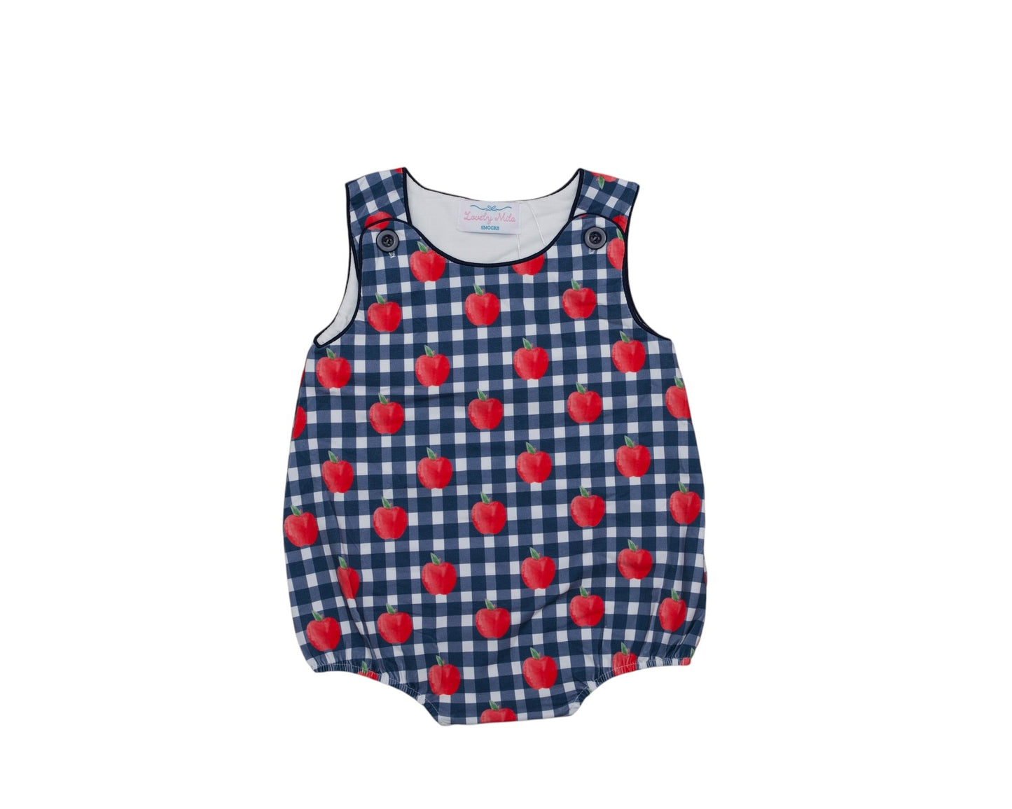 Baby romper with red heart pattern on a blue checkered background