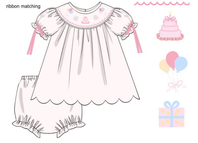 Children's dress with matching bloomers and accessories on a white background