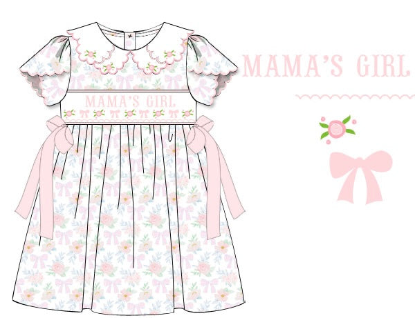 Hand-smocked MAMA’S GIRL dress in 100% cotton with flowers, bow, hand-embroidered rosettes, scalloped collar and sleeves. Classic, timeless, heirloom design.