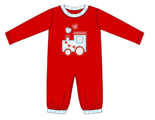 Cupid’s Caboose Romper for boys features soft knit fabric with a charming train and heart appliqué. Perfect for Valentine’s Day outfits and photo moments.