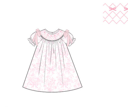 Pink floral dress with ruffled sleeves on a white background