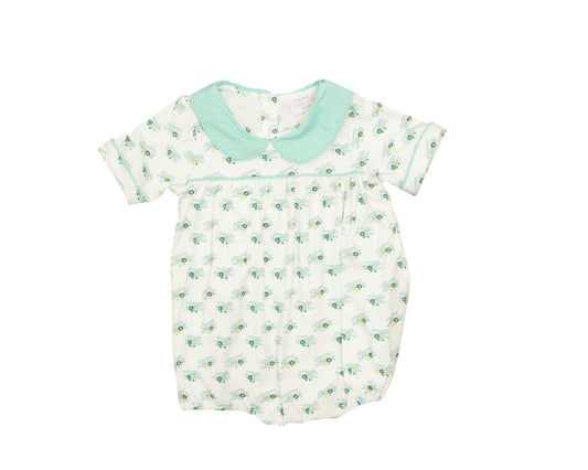 Baby romper with floral pattern and green collar on a white background