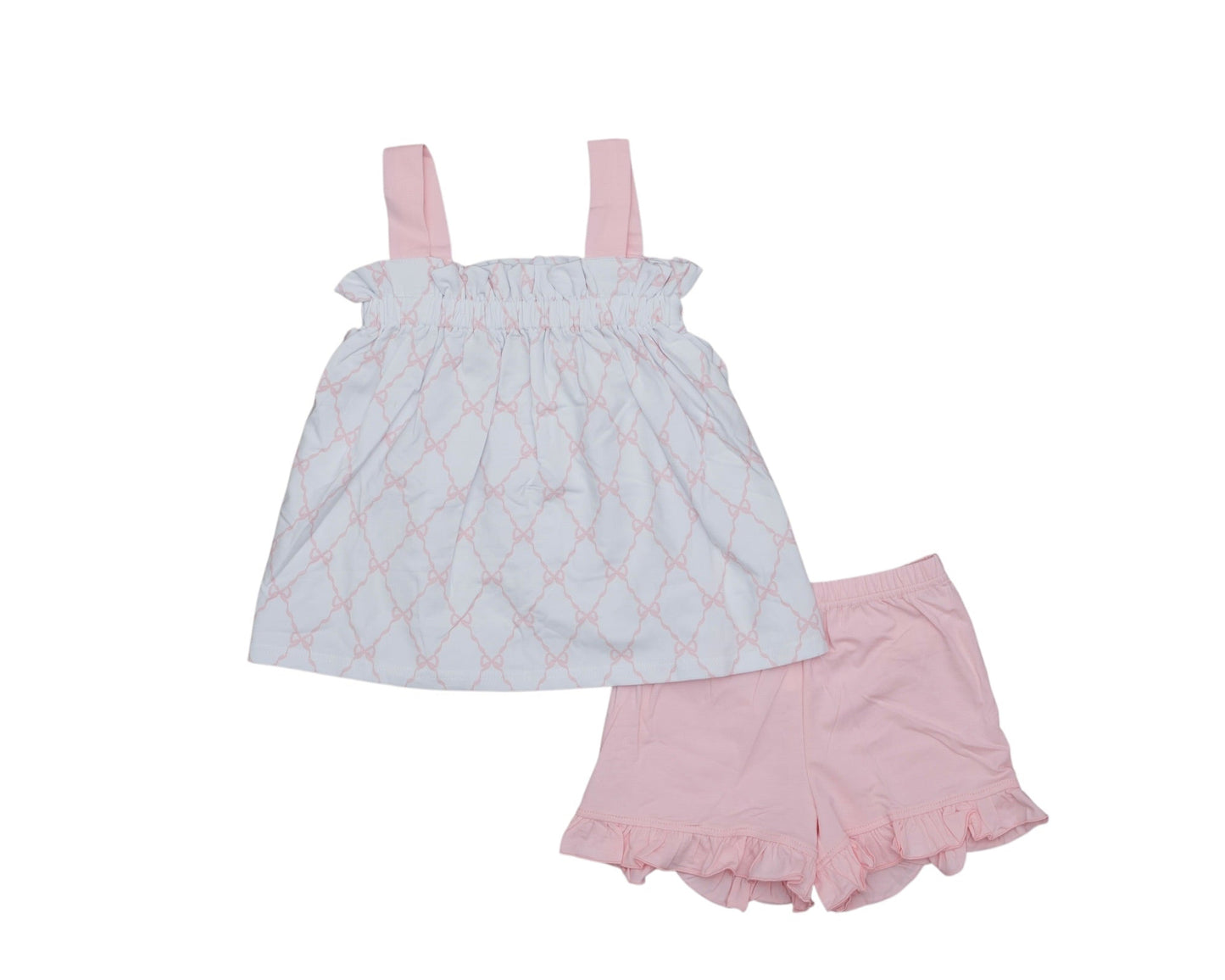 Children's dress and shorts set with pink straps on a white background