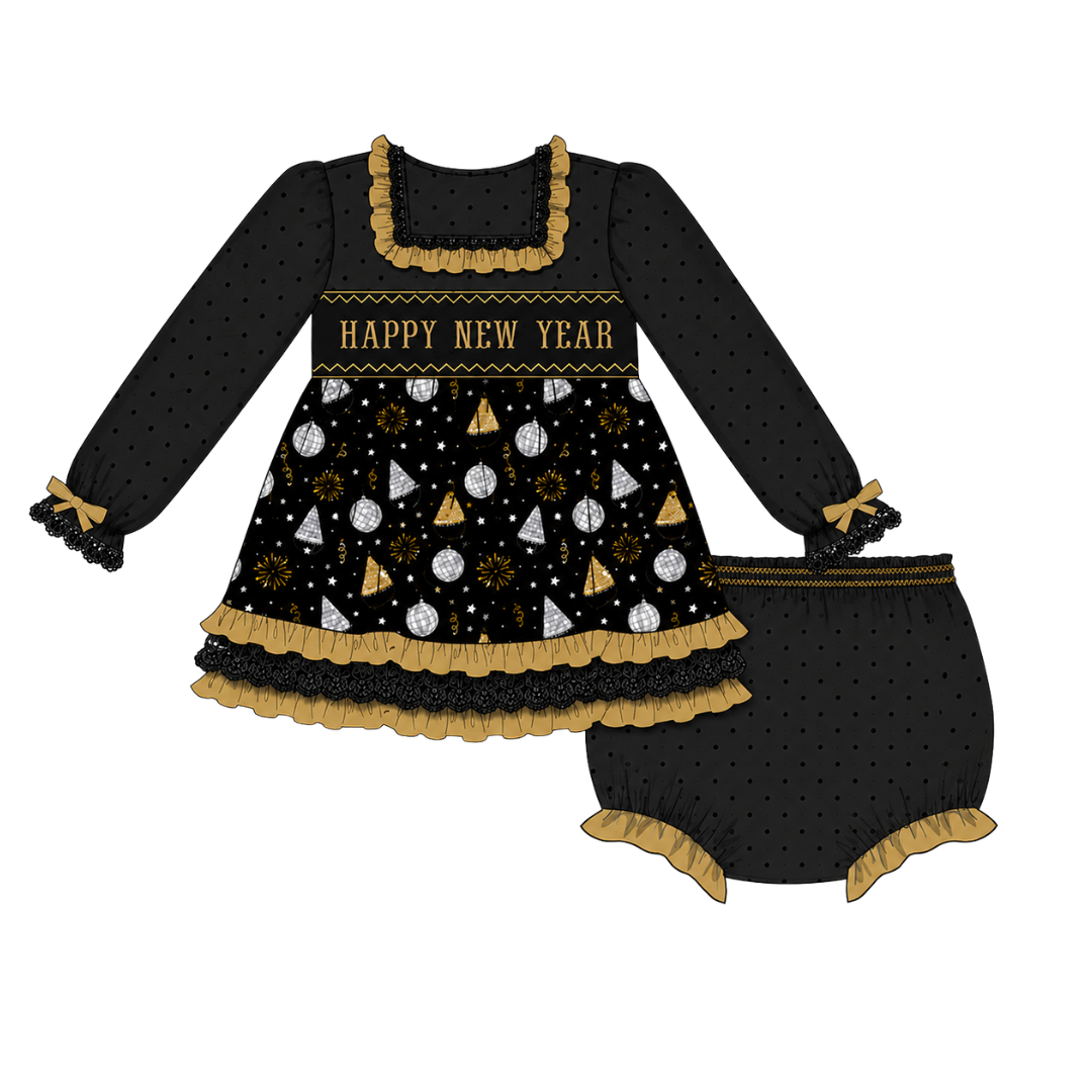 A two-piece baby outfit set featuring a long-sleeve dress and matching bloomers in black with gold ruffles, gold trim, and a festive New Year print with white stars, gold and white geometric shapes, and 'HAPPY NEW YEAR' text.