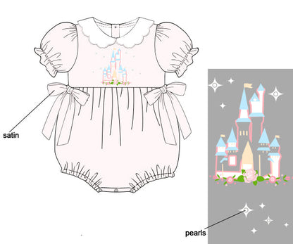 Children's outfit with castle design and satin details, labeled with 'pearls' and 'satin'.
