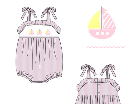 Sail Away Bubble romper for baby girls, hand-smocked with nautical-themed details. Made from 100% cotton, soft and comfy, perfect for playdates, birthdays, and family photos.
