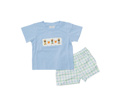 Children's blue t-shirt with bunny design and green checkered shorts on a white background