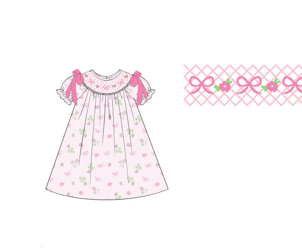 The Belle Fleur Doll Dress with delicate flowers and bow, made from soft cotton. Perfect for matching play, tea parties, birthdays, and photo shoots.