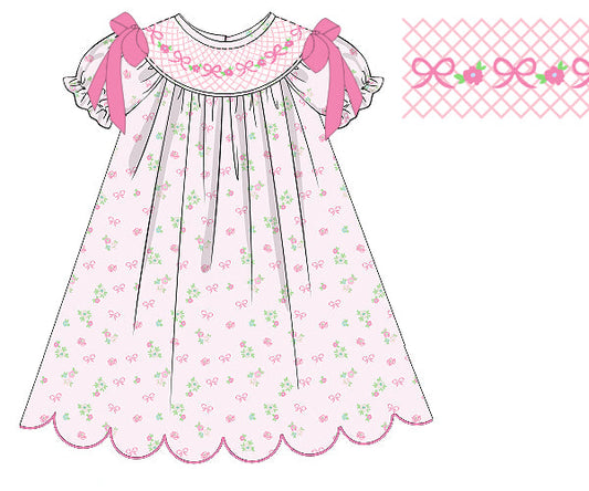 The Belle Fleur baby girl dress with delicate flowers and bow, made from soft cotton. Perfect for birthdays, portraits, holidays, or everyday summer wear.